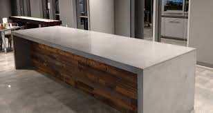 This diy creates a beautiful and functional coffee bar from reclaimed wood, and a durable concrete top was molded to fit the wood base. Concrete Countertops Beton Studio