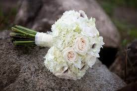 Full service floral shop for all your wedding, funeral, holiday and daily flower needs. Weddings Flowers By Emily
