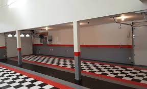 Garage floor tile company bundles are a cost effective way of choosing flooring for a set area, including ramps. David C Black And White Red Border Garage Tile Garageflooringllc Com