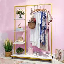 Shop our great selection of gold rolling rack & save. Floor Standing Garment Clothes Display Racks Modern Lady Rolling Gold Clothing Racks With Wheel Hanging Clothes Display Shelves With Wood Storage Shelf For Bedroom Living Room Cloth Store Home Kitchen Handmade