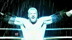 The fight wades its way through the crowd and into the backstage. Triple H Oww