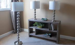 In the living room, for example, you might begin by hanging a decorative ceiling fixture near the center of the room, said nathan orsman, a lighting designer depending on a room's layout, he said, accent lights could be used to highlight art, and table lamps could be placed beside seating to add another. Types Of Lamps For The Living Room And More The Home Depot
