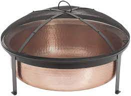Copper and concrete fire bowls. Amazon Com Cobraco Sh101 Hand Hammered 100 Copper Fire Pit With Screen And Cover Garden Outdoor