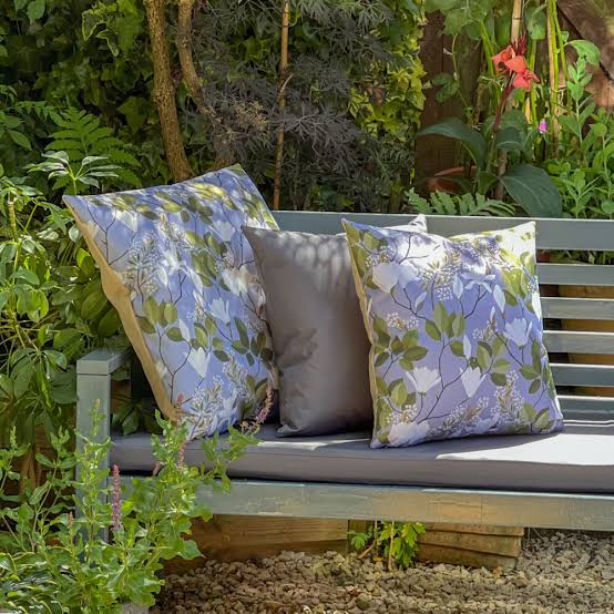 Water-resistant outdoor scatter and bench cushions, AI generated