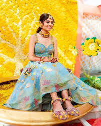 A phoolon ki haldi with a standout blue outfit instead of ...