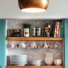 Fan housing baskets for overhead storage. 16 Kitchen Shelf Ideas That Will Double Your Storage Space Apartment Therapy