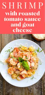 Shrimp With Roasted Tomato Sauce And Goat Cheese Recipe Seafood Dinner Roasted Tomato Sauce Roasted Tomatoes