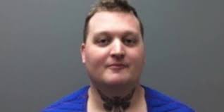 Former U.S. Marine booked with federal charge for allegedly threatening ICE  agents