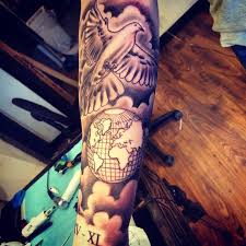 Clouds and flying dove tattoo on left back shoulder. Dove Tattoos For Men Dove Tattoos Globe Tattoos Dove Tattoo Design