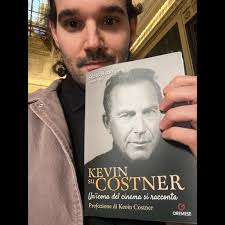 Eloise Jones of the Independence Police Department pictured here with  famous actor Kevin Costner during the production of “The Highwaymen” being  filmed in Independence.