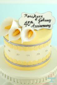 Delightful anniversary party food ideas you need. Yellow And Silver Cakes