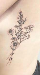 200 Photos Of Female Tattoos On The Arm To Get Inspired Pictures And Tattoo Flowertattoos Flower Tattoos Sunflower Rib Tattoo Black Tattoos Rib Tattoo