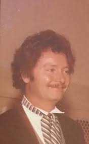 Memories made in his visit north Carolina visiting his aunt Elonna J Colvin  Jandro . He loved his fires. Told her rain not gonna put fire out Umbrella  and a beer making