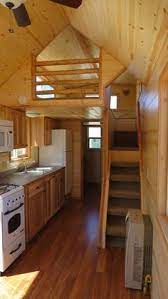 Spacious Tiny House Living In Rich S Portable Cabins Tiny House Cabin Tiny House Living Tiny House Interior