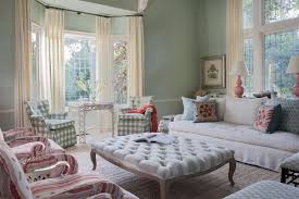 Mint room decor ideas green living and cream decorating wall. Colorful Pastel Living Room With Mint Green Walls Large Tufted Coffee Table And Mixed Patterned Chairs Hgtv