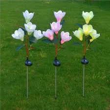 The garden stake yard art also includes a solar light at the top of the garden stake. 96 Solar Flower Lights Ideas