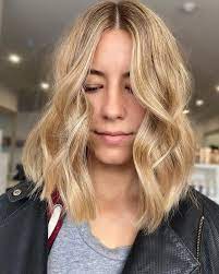 21 Flattering Middle Part Hairstyles Trending For 2021 Middle Part Hairstyles Middle Part Haircut Middle Parts