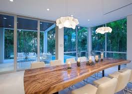 Nothing says rustic more than a tree stump in your dining room. Raw Natural Goodness 50 Live Edge Dining Tables That Wow Wood Slab Dining Table Slab Dining Tables Dining Room Contemporary