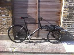 A lightweight frontloader cargobike perfect for carrying bulky packages. Stolen Omnium Mini Max