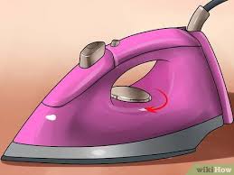 For slightly wrinkled curtains, simply hang in a warm room to allow wrinkles to fall out. How To Iron Curtains 13 Steps With Pictures Wikihow