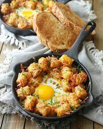 Baked Tater Tots With Cheese Bacon Eggs By The Colors Of Yum Quick Easy Recipe The Feedfeed Recipe Breakfast Recipes Easy Breakfast Skillet Recipes Cast Iron Recipes