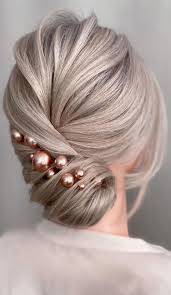 If you opt for no veil, you can incorporate a floral hair accessory into the style (as shown in a few images below). 75 Trendiest Updo Hairstyles 2021 Twisted Chignon Bridal Hair Do