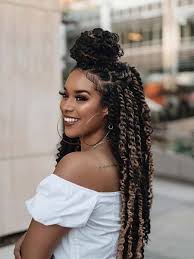 For extra flair, try weaving in extensions of a different color for a highlighted effect. 20 Passion Twist Hairstyles That Will Protect Your Hair The Trend Spotter