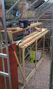 Super easy diy greenhouse shelves these shelves are great for greenhouses or garages where you don't need a place to store items, but you don't want to spend a lot of money on the project. Diy Greenhouse Shelves By My Own Fair Hand Flickr