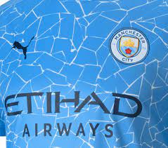 It is predominantly white in colour with a standard navy colour tone print. New Mcfc Kit 2020 21 Puma Unveil Man City Home Shirt With Mosaic Design Football Kit News
