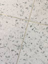 Homeadvisor's terrazzo floor installation cost guide gives price per square foot for poured terrazzo flooring vs. White Terrazzo And Brass In 2020 Terrazzo Flooring Terrazo Flooring Flooring