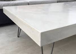 As you can see, each box can face outward to provide extra storage shelves, while the stunning stained wood surface offers a place for drinks and more. Diy Concrete Coffee Table Skilldeer
