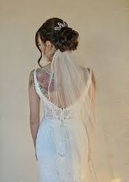 Romantic Low Bun With Veil Underneath By The Art Of Ash Low Bun Wedding Hair Bridal Updo With Veil Wedding Hairstyles With Veil
