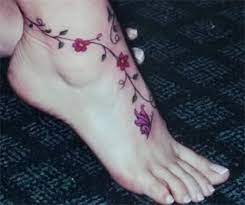 Although the design of the drawings on the right foot (a budding flower) is completely different from that on the left foot (a leaf shooting from a twig), the main purpose of enhancing beauty is highly achieved by this foot tattoo idea. Flower Foot Tattoos For Women