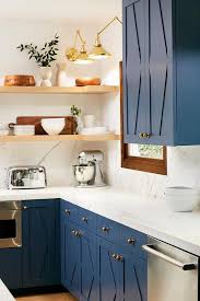 Rejuvenate cabinet & furniture restorer restores life to the finished wood, formica, and laminate surfaces on a wide variety of kitchen cabinets, bathroom cabinets, furniture and wall paneling. Blue Kitchen Cabinetry With Aged Brass Knobs Transitional Kitchen