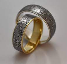 Damascus Rings With Gold And Silver Liners For More Go To Www Cosmoknives Com Email Seth Cosmoknives Com Rings Men S Wedding Ring Art Deco Ring