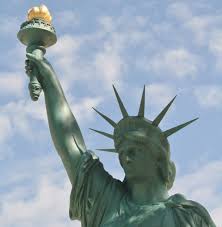 An inscription on a bronze plaque sits at the bottom of the monument. Statue Of Liberty Enlightening The World On Place Picard Invisible Bordeaux