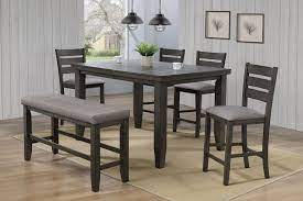 Crafted from solid rubberwood, each piece pairs clean lines with curves along with neutral finishes of black and medium. Bardstown Counter Height Table 4 Chairs And Bench Gray 2752 Cm T 4 B Gy Dining Room Groups Price Busters Furniture