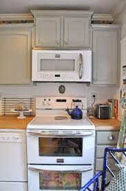Check spelling or type a new query. Brainstorming On Raising Cabinet Above Stove What To Do About Molding For Ceili Above Kitchen Cabinets Decorating Above Kitchen Cabinets Grey Kitchen Cabinets