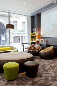 The Puro Hotel In Wroclaw Poland Was Furnished In Part By Ligne Roset This Particular Lounge Includes Our Ott Hotel Lobby Design Hotel Furniture Small Hotel