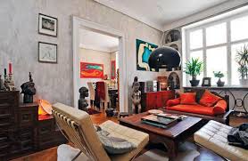 You can use these colors along with i strongly recommend to use original african art objects to create a focal point anywhere in the room. African Themed Living Room With African Wood Sculptures Decolover Net