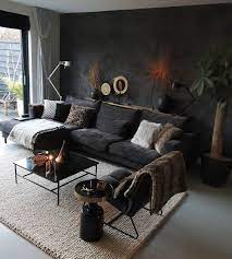 A Black Wall In The House With A Beautiful Concrete Look Living Room Decor Apartment Black Living Room Black Sofa Living Room