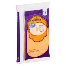 These certified organic slices are pretty low calories, with only 60 calories a slice. Great Value Deli Style Sliced Medium Cheddar Cheese 12 Count 8 Oz Walmart Com Walmart Com