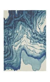 Why Settle For A Simple Area Rug When You Can Elevate Your Look With A Watercolor Inspired Print Blue Area Rugs Modern Area Rugs Watercolor Rug