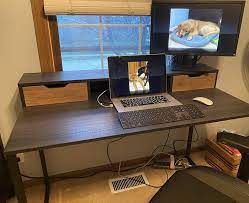 Computer desk with raised monitor shelf. 26 Desks That Reviewers Truly Love