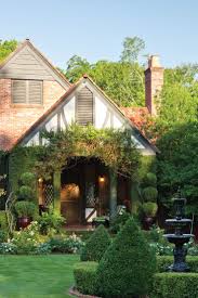Five Design Secrets For Creating A Gracious Home Victoria Magazine Cottage Exterior Tudor Style Homes Tudor Cottage