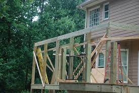 This is how the brick mason built the porch foundation. Building A Shed Roof Over A Deck Decks Com