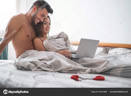 Happy Couple Watching Computer While Lying Bed Blanket Young Lover — Stock  Photo © AlessandroBiascioli 251913096