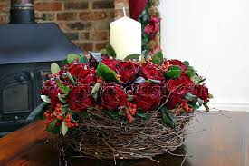 Deck the halls with boughs of holly, a dozen red roses, or bountiful red poinsettias. Christmas Flower Arrangements Archives Wedding Flowers Blog