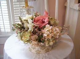 A clutch of faded blooms from helleborus ericsmithii 'winter moonbeam' in a vase from my collection of caithness glass 'ebony' pieces. Shabby Chic Flower Arrangement Novocom Top