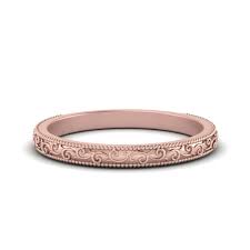 Rose gold engagement rings are one of the hottest jewelry trends that offer a unique but timeless style. Hand Engraved Wedding Band In 14k Rose Gold Fascinating Diamonds